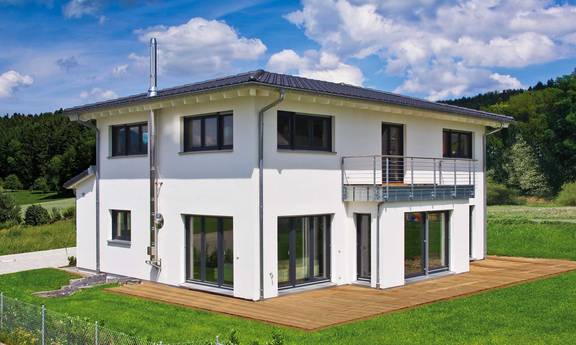 Garten und Terrasse Haus Studer von Fertighaus WEISS